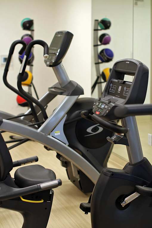 A close up of a stationary bike in a gym.