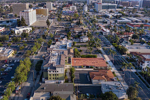 A cityscape with buildings and roads.
