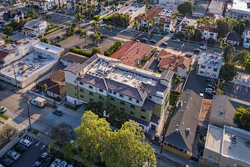 A residential area with houses and trees.