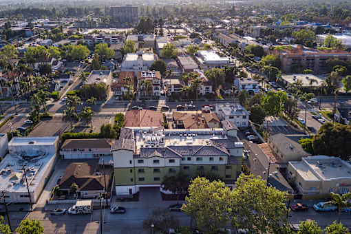 A residential area with houses and trees.