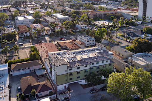 A view of a residential area with houses and buildings.