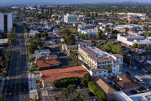 A cityscape with buildings and roads.
