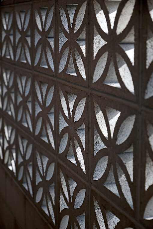 A close up of a decorative iron gate.