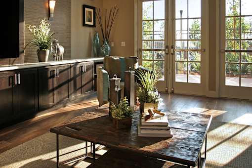 A room with a table and chairs in it.