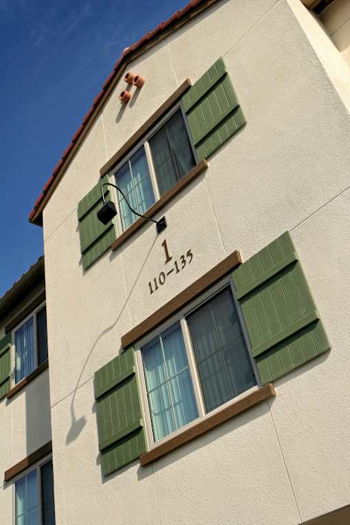 A building with the number 110-135 on it.