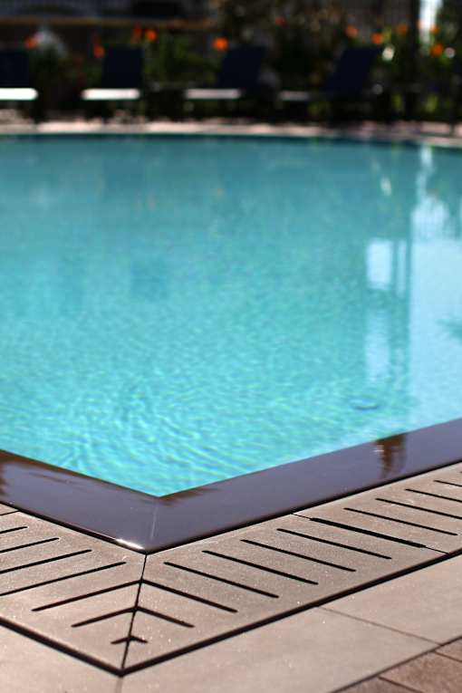 A pool with a brown border.
