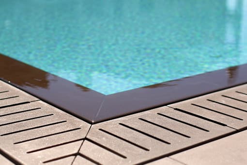 A pool with a brown border.