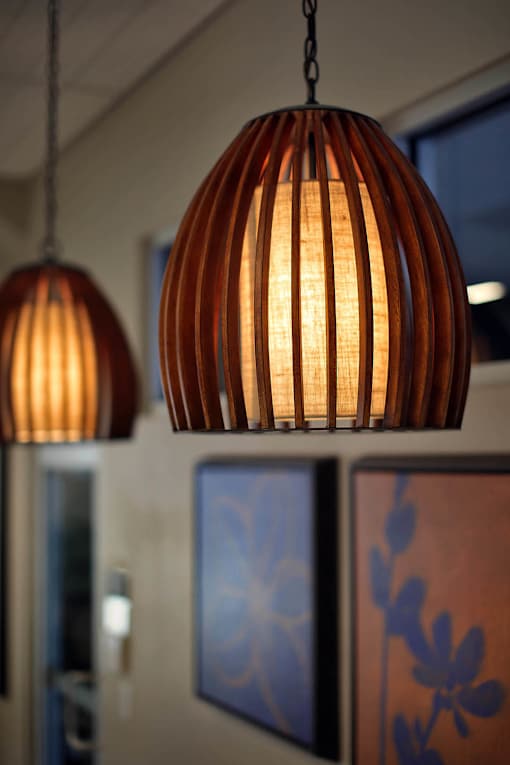 Two hanging lamps with a warm glow.