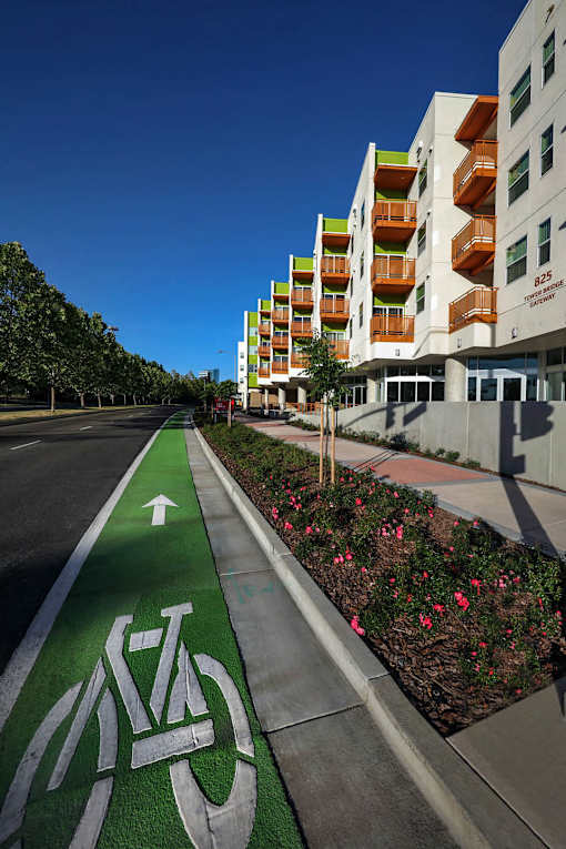A bike lane is on the left side of a street.