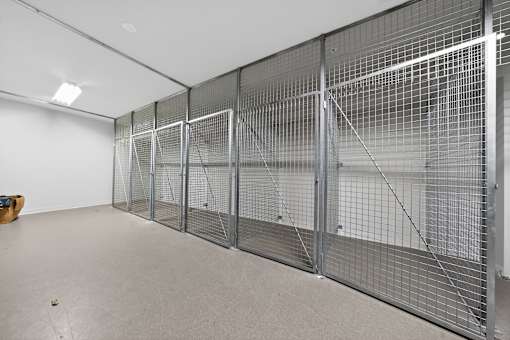 A room with a metal partition wall.