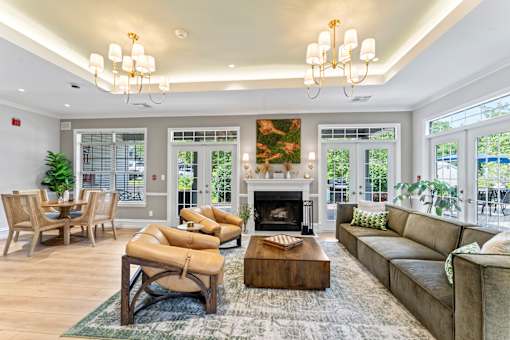 A living room with a fireplace and a couch.