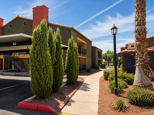 A street view of a building with the number 63 on it.