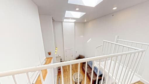 a view from the top of the stairs looking down