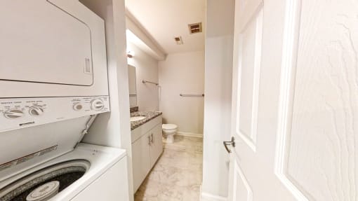 a laundry room with a washer and dryer