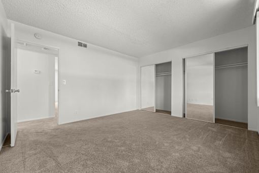 our spacious living room is empty and ready for you to move in