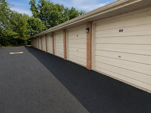 A long row of garage doors are closed.