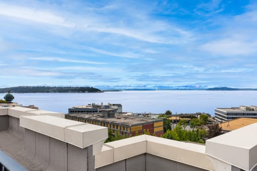 the view of the water from the roof of a building
