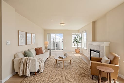 A living room with a fireplace and a couch.