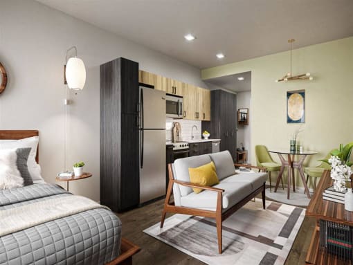 a bedroom with a bed and a kitchen with a refrigerator