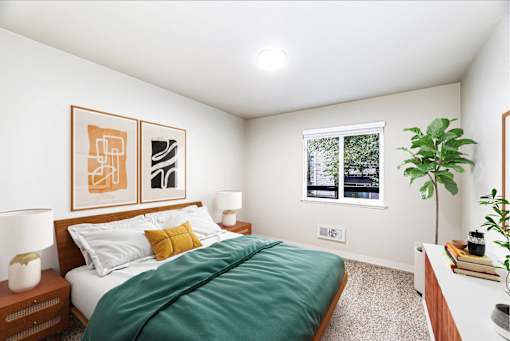 A bedroom with a bed, two lamps, a potted plant, and two framed pictures on the wall.
