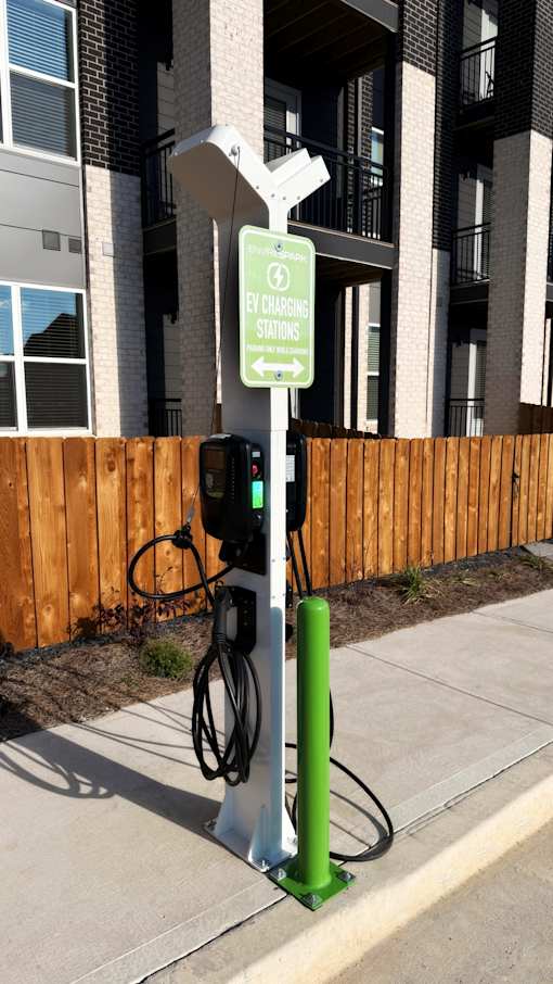 A bike rack is attached to a sign that says