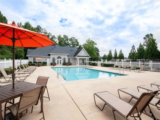 pool with lounge chairs