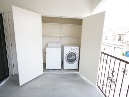 Bright Laundry Room at Dominion Courtyard Villas, Fresno, CA, 93720