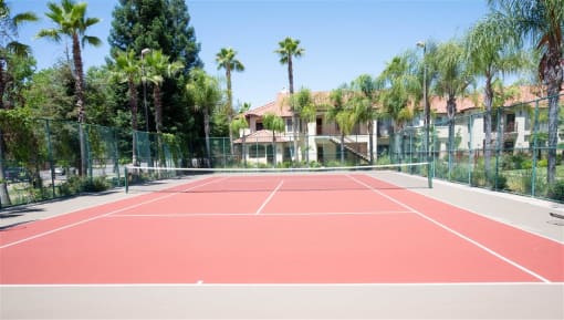 Open Tennis Court at Dominion Courtyard Villas, Fresno