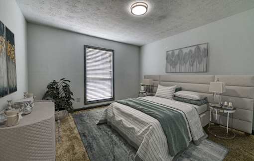a bedroom with a bed and a window
