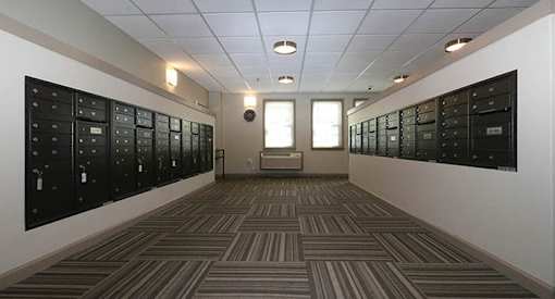 a view of the ceiling of a building with lights on it