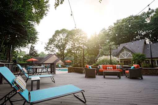 decatur luxury living a large deck with furniture and a pool
