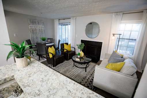 decatur luxury living an aerial view of a living room with a couch and a table