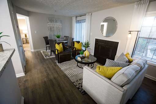 a living room with a couch and a fire place