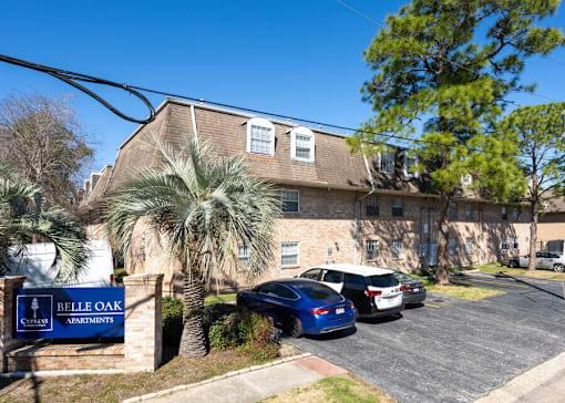 Belle Oak Apartments is a residential complex with a parking lot.