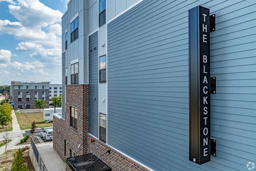 The Blackstone building with a sign on the side.