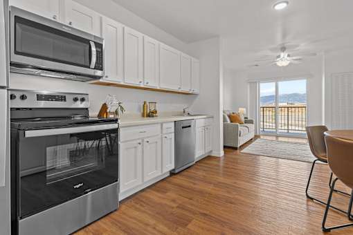 Kitchen with wooden floor at Yellowstone Landing, Belgrade, MT, 59714