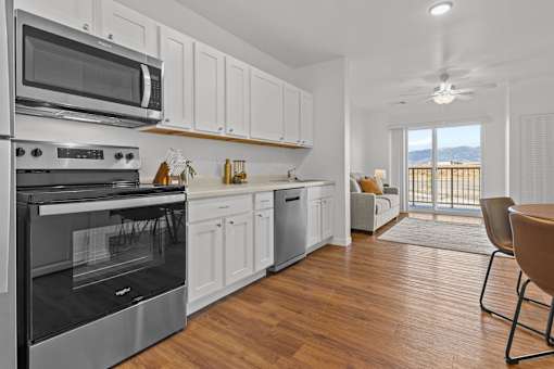 Kitchen with wooden floor at Yellowstone Landing, Belgrade, MT, 59714