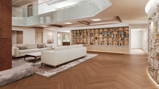 a living room filled with furniture and a library at Hearthstone Lodge Senior Residences, Auburn, 95602