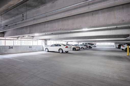 Parking garage with cars parked at 747 Apartments, Indianapolis, Indiana