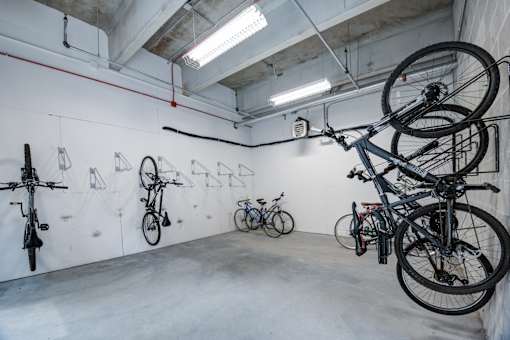 Room full of Bicycles hanging on the wall at 747 Apartments, Indiana, 46202