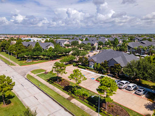 Parking lot of residential area at Avenues at Shadow Creek Ranch Apartments, Pearland, Texas