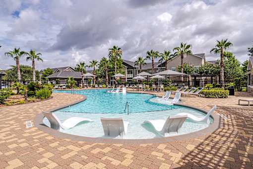 Swimming Pool With Relaxing Sundecks at Avenues at Shadow Creek Ranch Apartments, Pearland, Texas, 77584