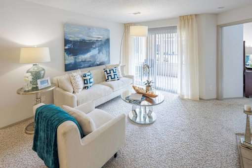 Living Room with White Couch at Butternut Ridge Apartments, North Olmsted, OH