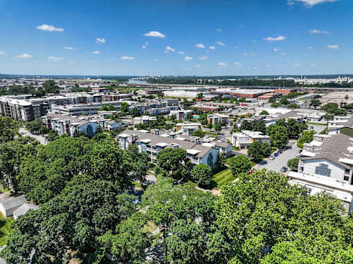 A bird's eye view of a residential area with houses and trees. at CityView, North Kansas City, Missouri