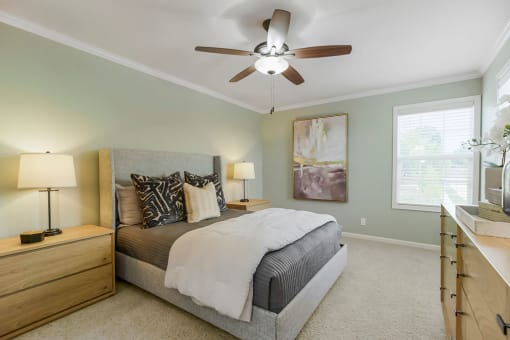 Bedroom With Ceiling Fan at Prairie Pines Townhomes, Kansas