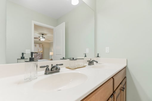 Renovated Bathrooms With Quartz Counters at Prairie Pines Townhomes, Shawnee, Kansas