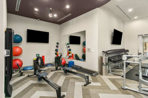Fitness Center With Yoga/Stretch Area at Discovery at Kingwood, Kingwood, TX, 77339
