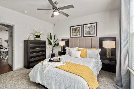 Bedroom With Ceiling Fan at Discovery at Kingwood, Kingwood, TX, 77339