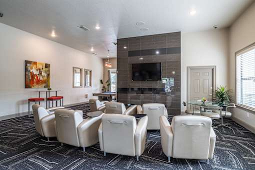 Clubhouse with white chairs at Grand Villas at Cinco Ranch, Texas, 77494