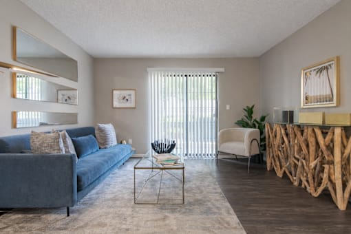 Living room with couch at Springhill Apartments, Overland Park